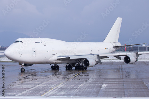 White Boeing 747-400 Jumbo Jet freighter on the ground in Graz, Austria