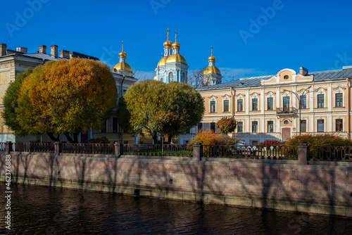 View of the Griboyedov Canal and the dome of the Nikolsky (Nikolo-Bogoyavlensky) Naval Cathedral on a sunny autumn day, St. Petersburg, Russia
