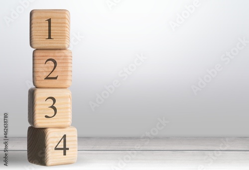 The order of priority in any activity is correct. A person sets wood blocks
