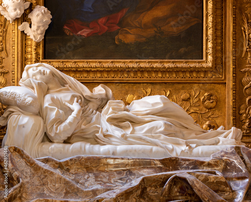 ROME, ITALY - AUGUST 29, 2021: The marbel statue of Ecstasy of Beata Ludovica Albertoni in the church Chiesa di San Francesco a Ripa by Gian Lorenzo Bernini (1671-1674).