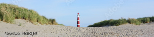 Red and white lighthouse on island Ameland, Dutch, Holland