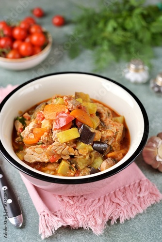 Turkey fillet stew with eggplant, zucchini, tomato, onion and garlic.