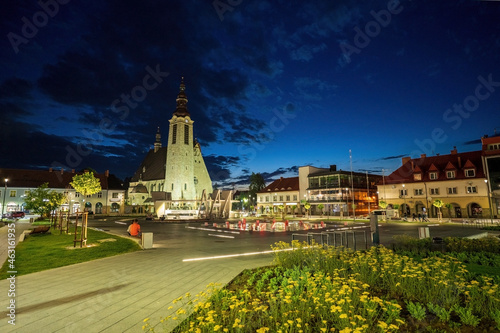 Limanowa, Poland : Panorama City center main square night view with a famous church and building cityscape a unit of local government powiat in Lesser Poland Voivodeship, southern Polish town