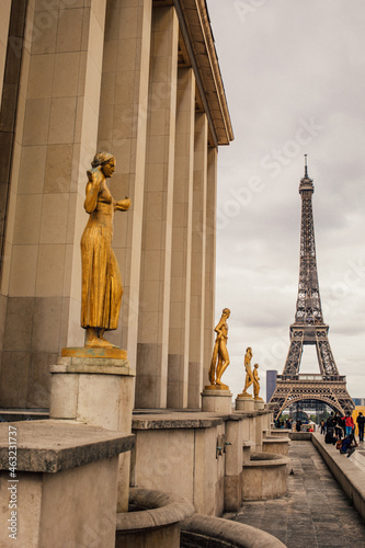 view of Eiffel Tower from Trocadero with the statues in the foreground 