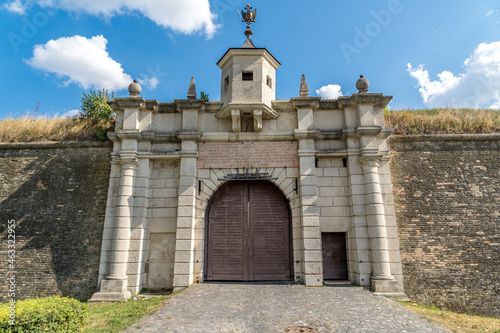 View of the fortified gate at Komarno fortress with sentry box, reinforced iron gate for cannons and separate pedestrian entrance for soldiers in Slovakia