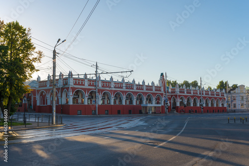 View of the old building of the Gostiny Dvor on a July morning. Kaluga