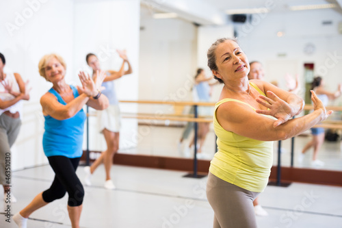 Group of adult activity people practicing dance techniques
