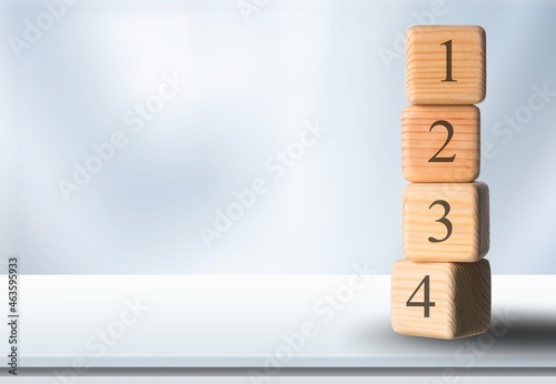 The order of priority in any activity is correct. A person sets wood blocks
