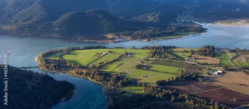 Aerial View of Fraser Valley with Canadian Nature Mountain Landscape Background. Harrison Mills near Chilliwack, British Columbia, Canada.