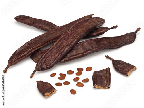 Carob isolated on white background, close up