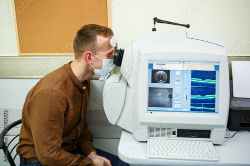 Professional medical equipment scanning the patient's eyes. The device of a modern healthcare clinic.