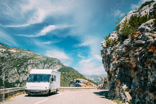 White colour Caravan motorhome car on background of mountain nature landscape