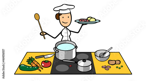 Köchin in Küche bereitet warme Mahlzeit zu