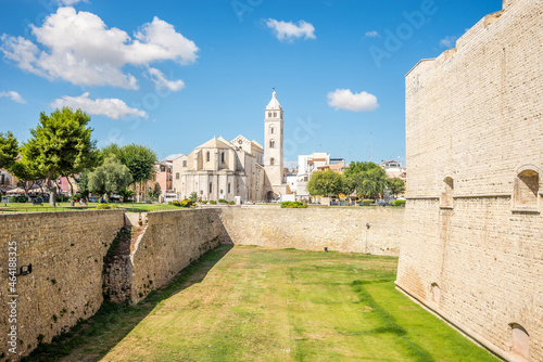 View at the Fortress with Cathedral of Santa Maria Maggiore in the background in Barletta town, Italy