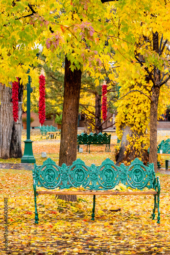 Nothing says it better than the Santa Fe Plaza dressed in autumn colors with the hanging red chili peppers or Ristras, and the colorful, artistic benches..