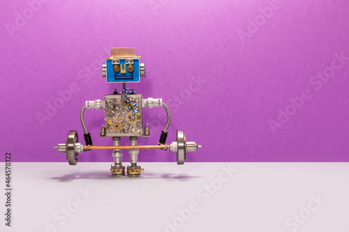 Robot athlete weightlifter holding a barbell loaded with heavy plates. Sport fitness, weightlifting and power lifting athletics workouts. copy space on violet gray background