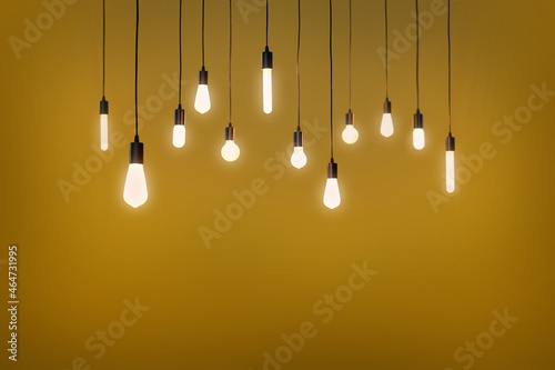 Bulbs electric and a light as a concept background 