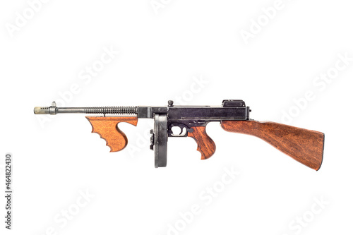 Old submachine gun of the Thompson system isolated on white background.