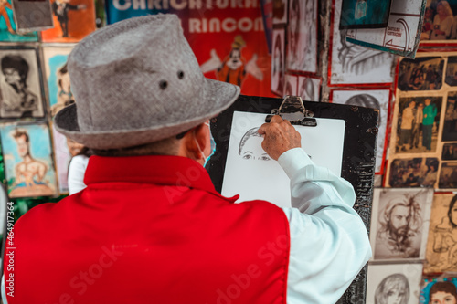 cartoonist painting a person on the street