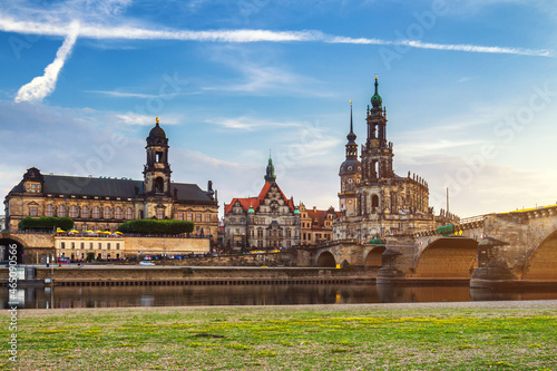 Augustus Bridge (Augustusbrucke) and Cathedral of the Holy Trinity (Hofkirche) over the River Elbe in Dresden, Germany, Saxony.