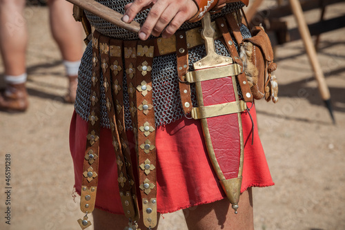 Centurion girding a pugio, a dagger used by roman soldiers as a sidearm