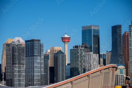 View of the Calgary Tower with modern skyscrapers under the blue sky, Alberta, Canada