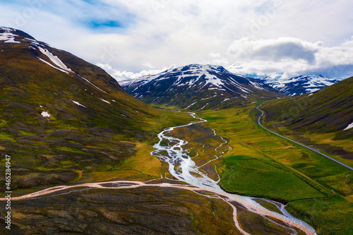 Aerial view of a road going through icelandic landscape