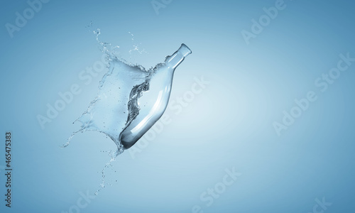 Water splash out of glass bottle