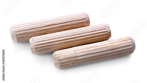 Wooden dowel pins on white background