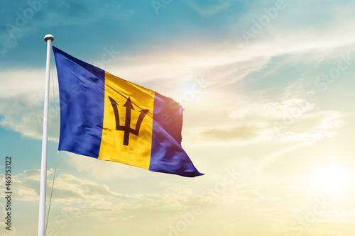 Barbados national flag cloth fabric waving on the sky - Image