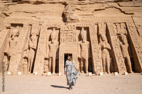 Female Traveler exploring Abu Simbel Temple in Egypt