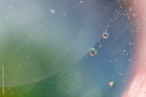 Oil bubbles in water. Macro shot. Abstraction- universe, galaxy, planets