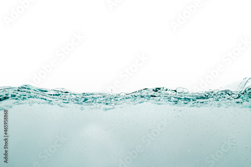 the rippling water from the side view. the side view of the water surface isolated on white. abstract liquid nature texture.