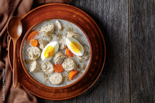 Zurek polish soup with white kielbasa on a bowl