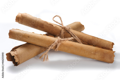 Many ancient paper scrolls isolated on a white background
