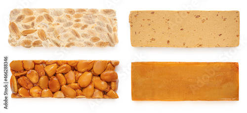 Collection of Turron nougat - traditional Spanish almond dessert isolated on white background. Christmas Turron candy.