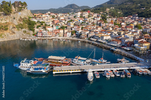 Aerial shot of port town of Parga and moored boats in West Greece Preveza