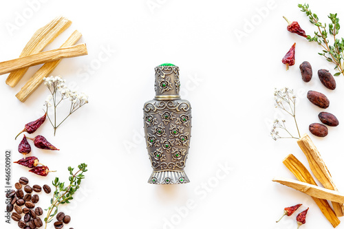 Arabian oud oil perfume with ingredients spices and fruits
