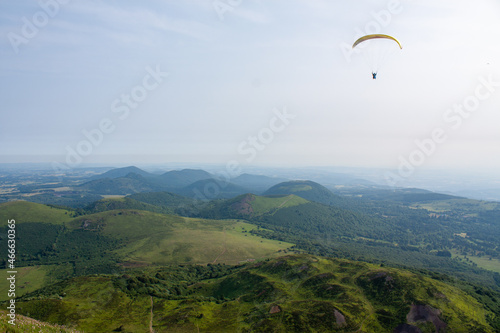 paraglider are flying in the valley.