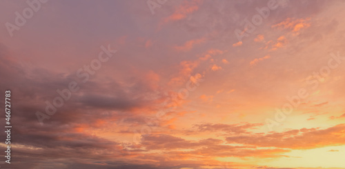 Golden hour sky with clouds. Ideal for sky replacement in modern photo editing software tools.