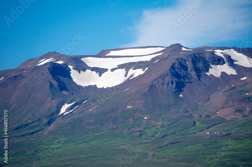 Landscape of snow capped mountains near Akureyri in north Iceland