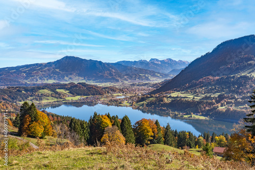landscape in autumn mood above lake Alpsee near Immenstadt with Gruenten summit in background, upper Allgaeu, Bavaria, Germany