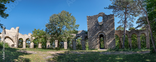 Artificial ruins of amphitheater built in 1811 by Prince Johann I von Liechtenstein on his estate near Mödling, Austria. The semicircular edifice with 16 vaulted arches borne on massive Doric columns.