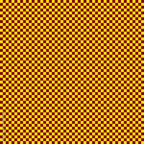Checkerboard with very small squares. Maroon and Yellow colors of checkerboard. Chessboard, checkerboard texture. Squares pattern. Background.