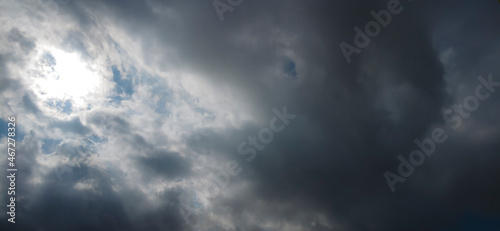 blurred blue sky with clouds and sun in Brazil