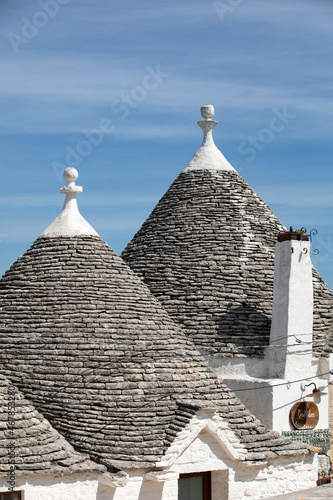 Stone roofs of Trulli Houses in Alberobello; Italy. The style of construction is specific to the Murge area of the Italian region of Apulia (in Italian Puglia). Made of limestone and keystone.