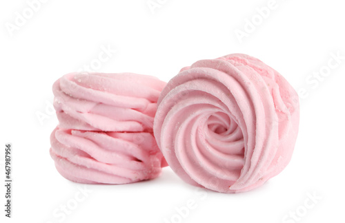 Two delicious pink zephyrs on white background