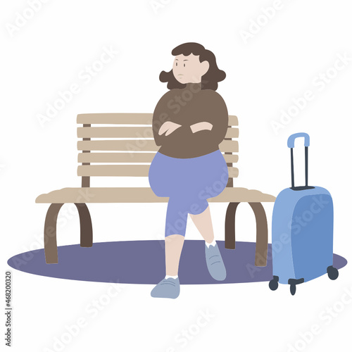Femme qui attend sur un banc. Femme qui part en vacances. Femme énervée par le retard de son train.