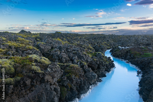 Iceland volcano stone bright blue river landscape