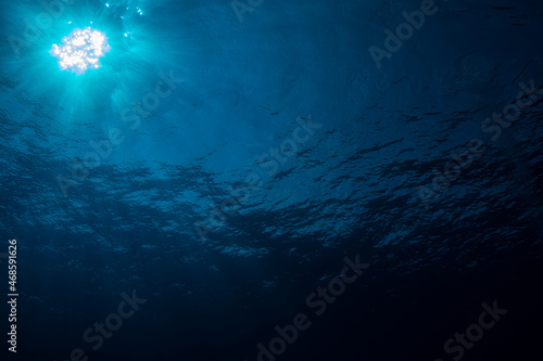 Sun with rays look from underwater